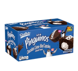 Box of 24 individual packages of Marinela Pinguinos snack cakes.